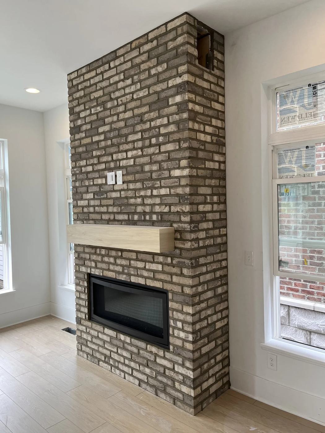 Tall thin brick fireplace column